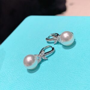 925 Sterling Silver Pearl Cross Stud Earrings Close Up